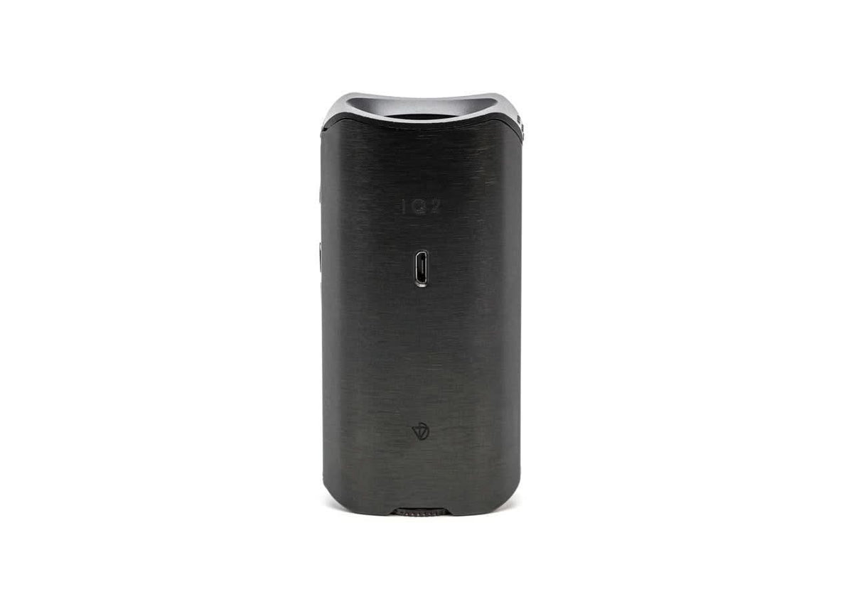 DaVinci IQ2 negro abierto, con la cámara revestida en vidrio y la cápsula dosificadora